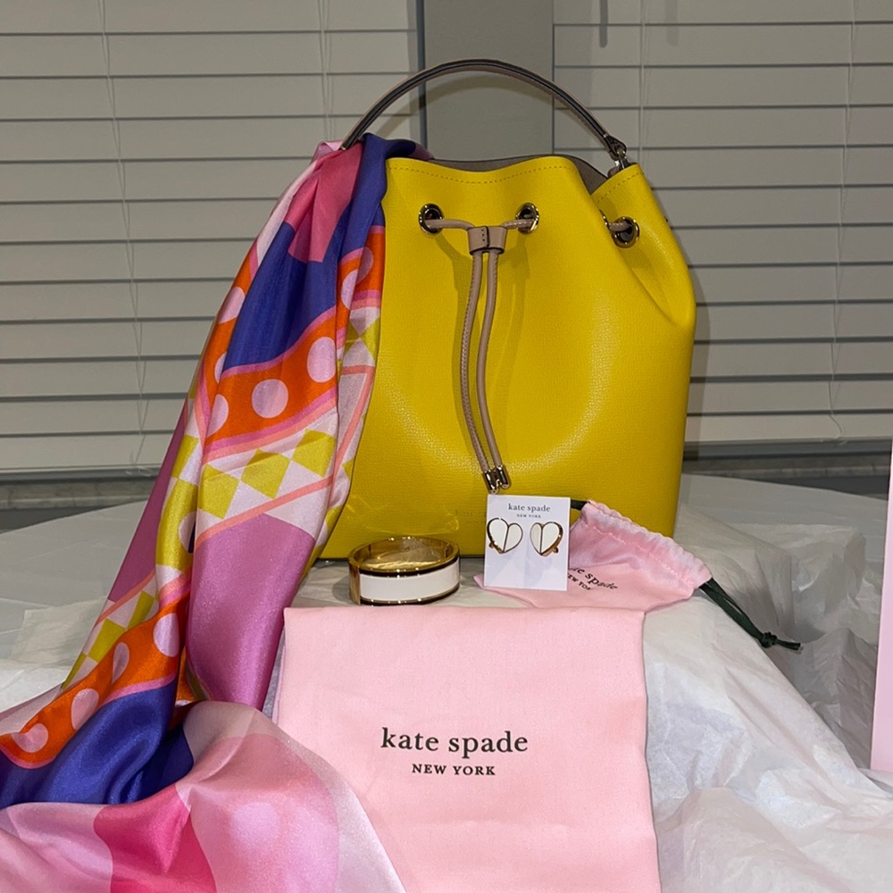 Kate spade fabulous bucket bag in canary yellow.